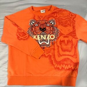 An orange Kenzo embroidered crewneck, size 14A (large), is in like new condition